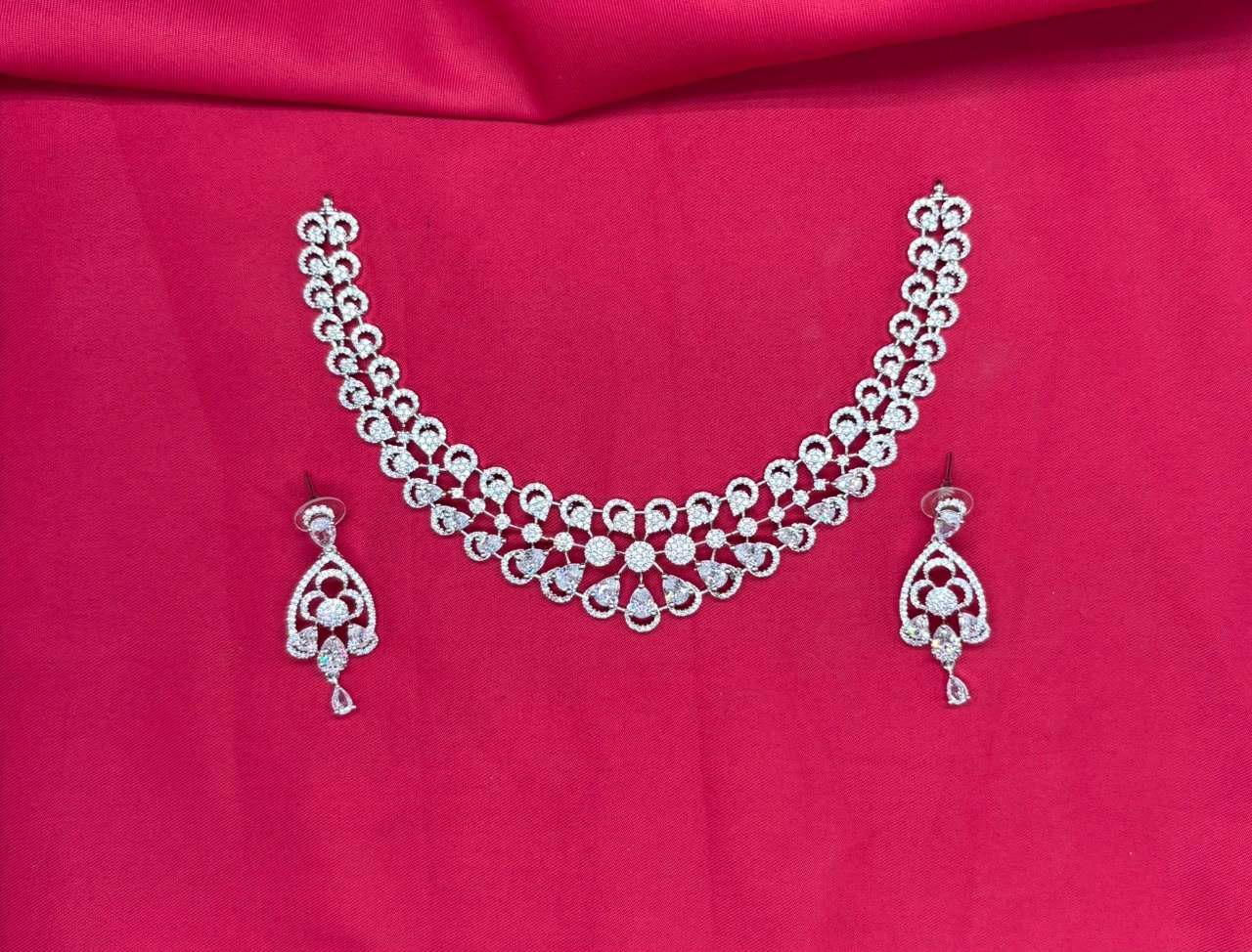 Silver finishing features white rhodium plated zircon with White stones short Necklace