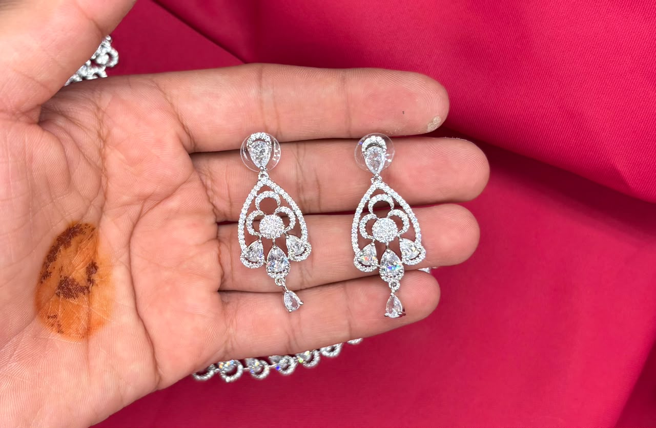 Silver finishing features white rhodium plated zircon with White stones short Necklace