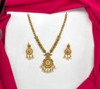 Nakshi finishing features intricate multicolored stones pearl accent Short Necklace
