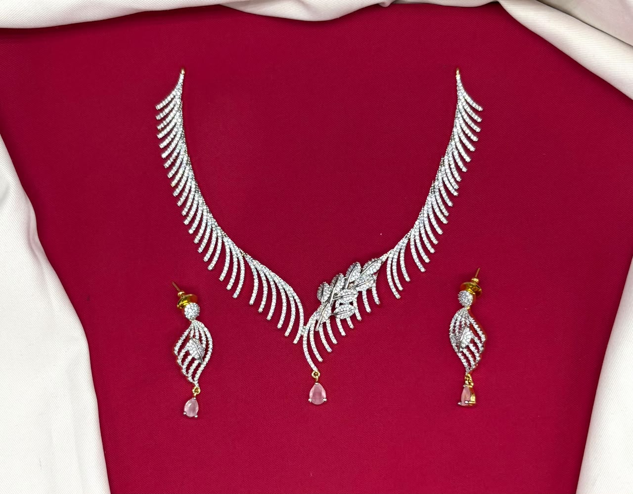 G.J finishing features rhodium with Baby-pink drop stones cubic zirconia short Necklace