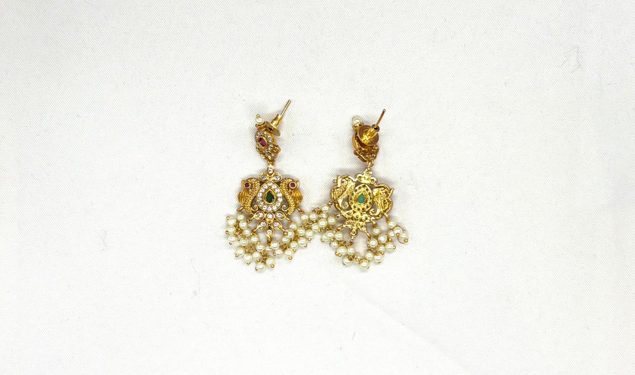 Nakshi finishing with Gold  plating with white pearls