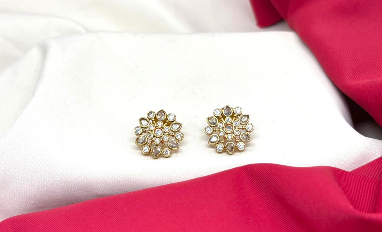Gold-tone kempu & AD stone floral stud earring