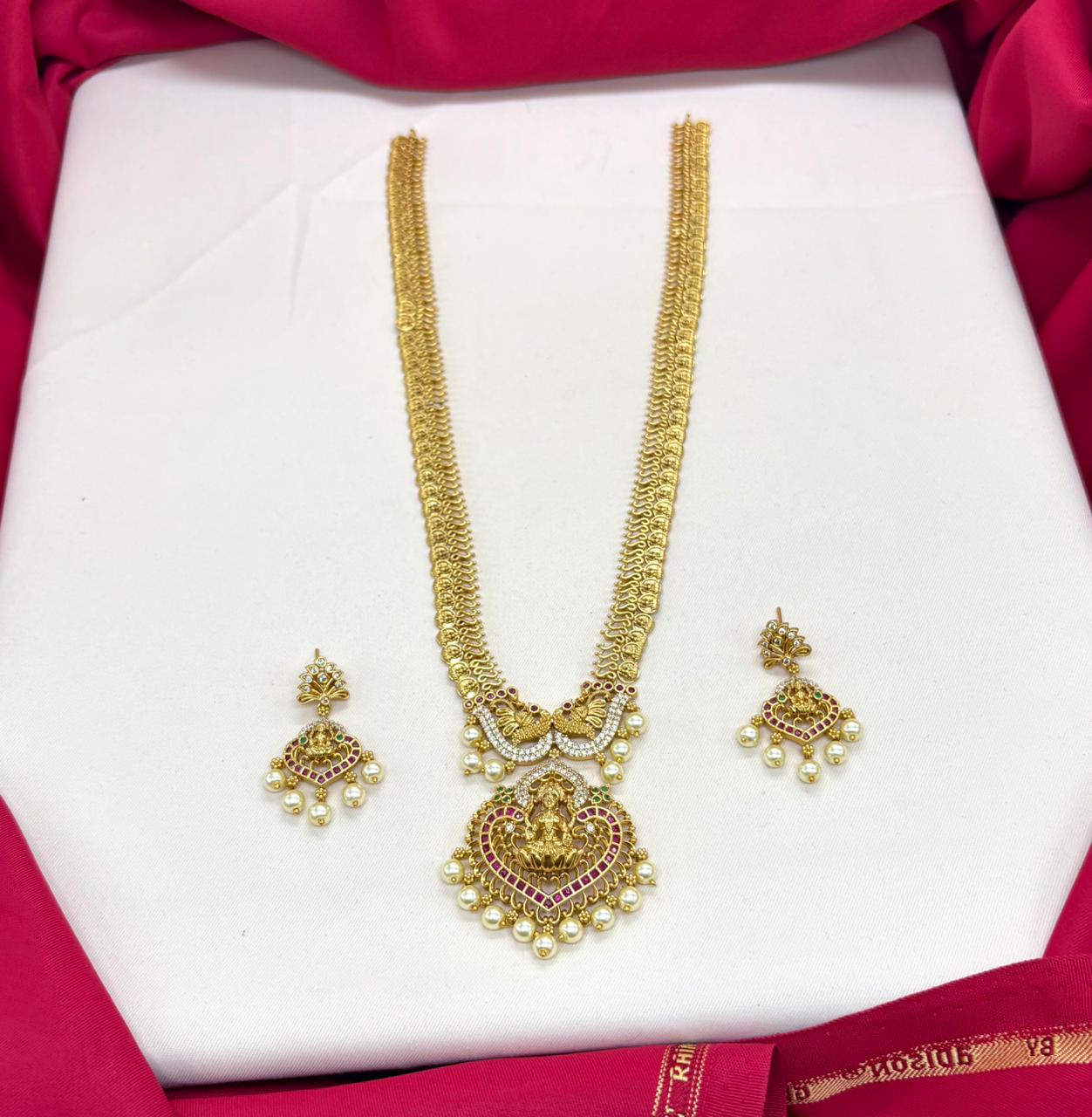 Matte finish lakshmi devi with pearls lomg haram