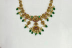Classic antique finish adorned green stones short Necklace