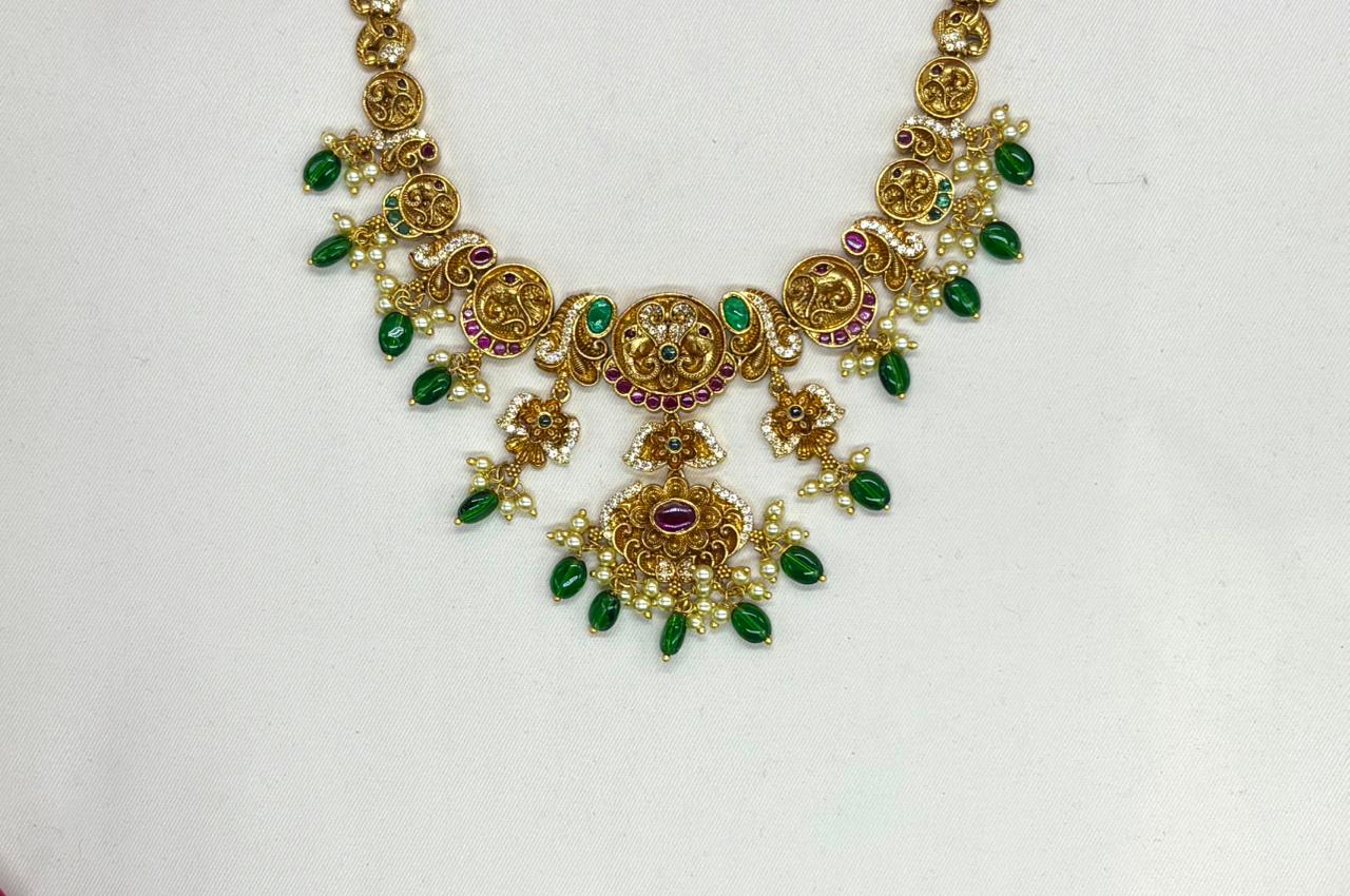 Classic antique finish adorned green stones short Necklace