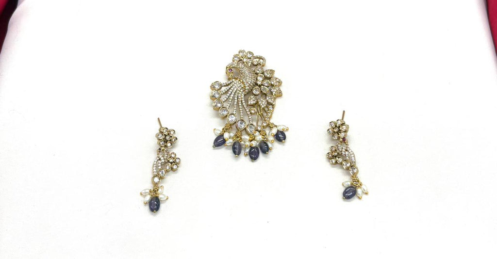 Victorian finishing peacock designed with purple monalisa beads Locket
