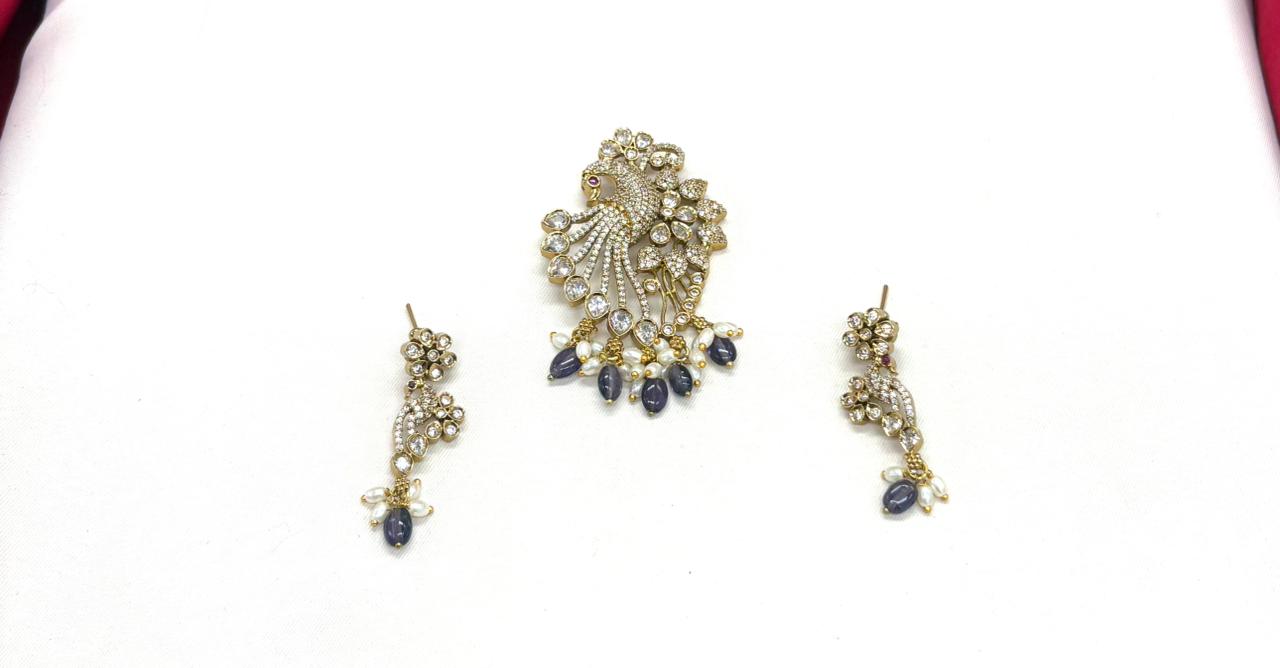 Victorian finishing peacock designed with purple monalisa beads Locket