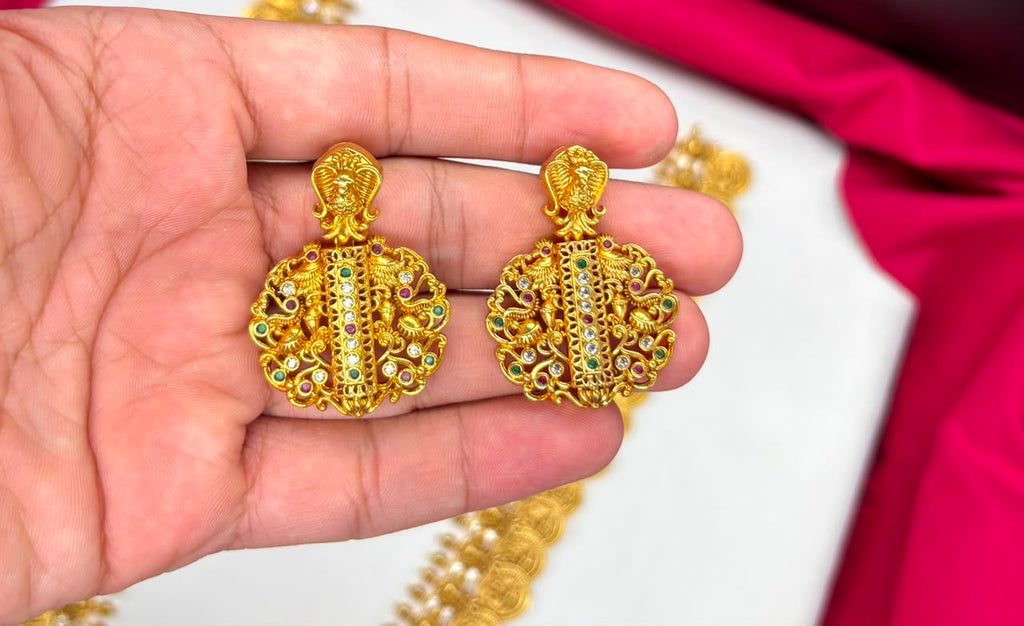 Matte finishing temple set features a long Lakshmi coin design haram necklace