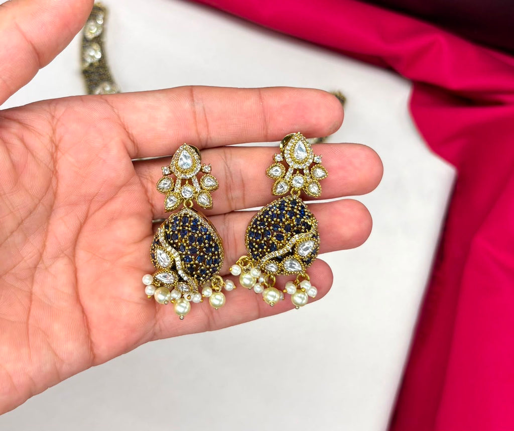 premium features intricate blue bead detailing and prominent kundan stone Necklace