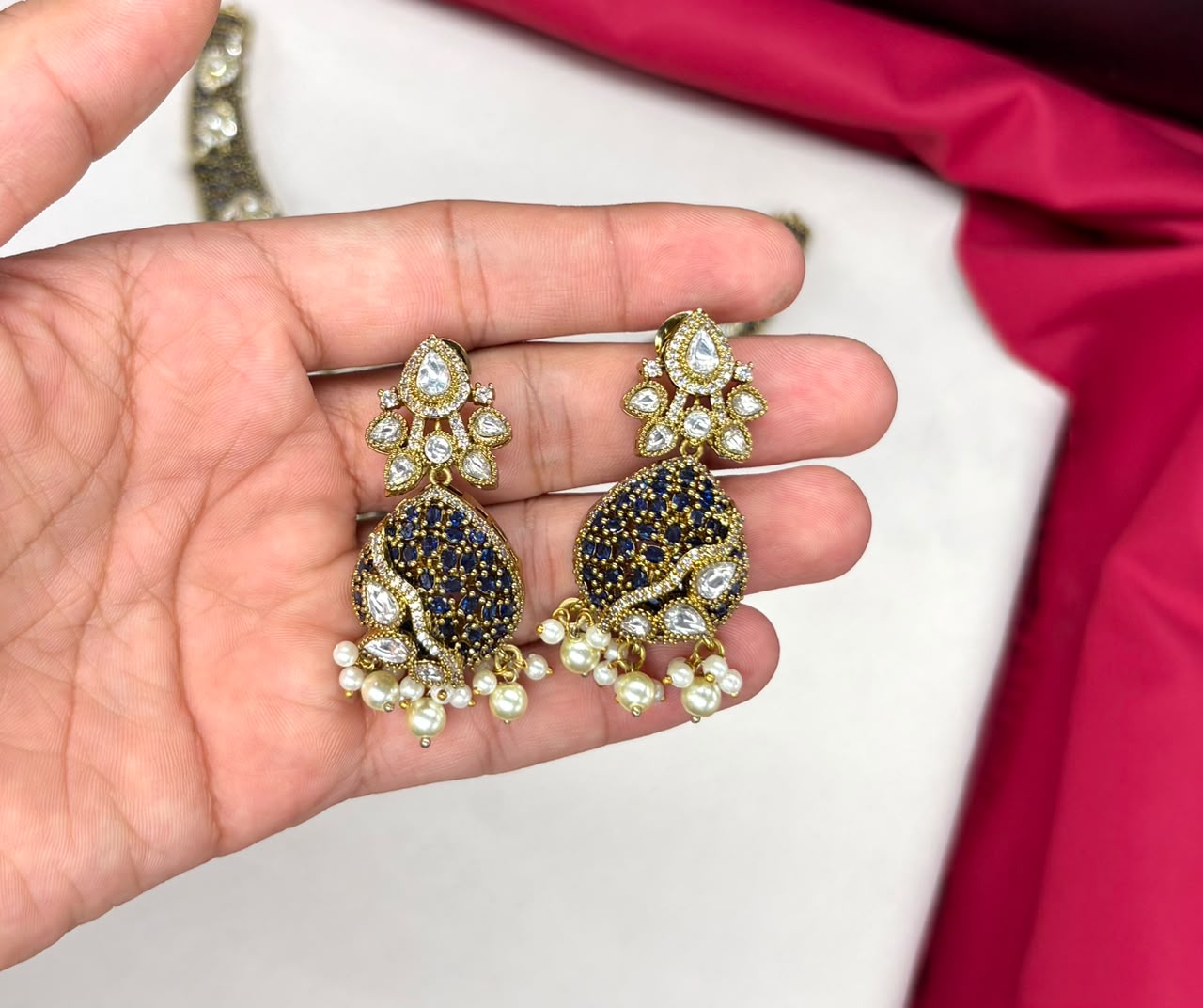 premium features intricate blue bead detailing and prominent kundan stone Necklace